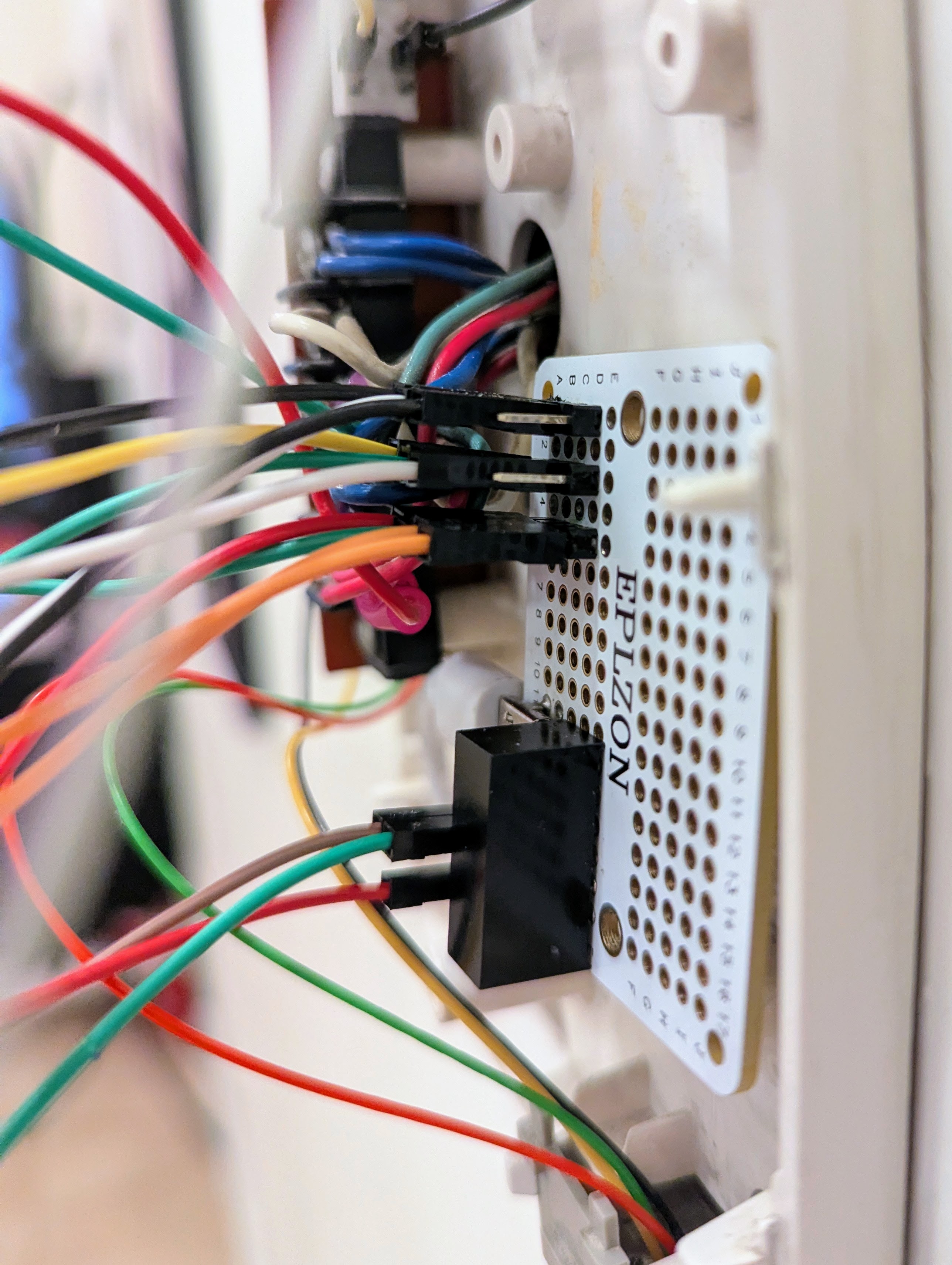 PCB I soldered to accept and isolate USB power in, and to bridge connections between the intercom and the Shelly Plus Uni